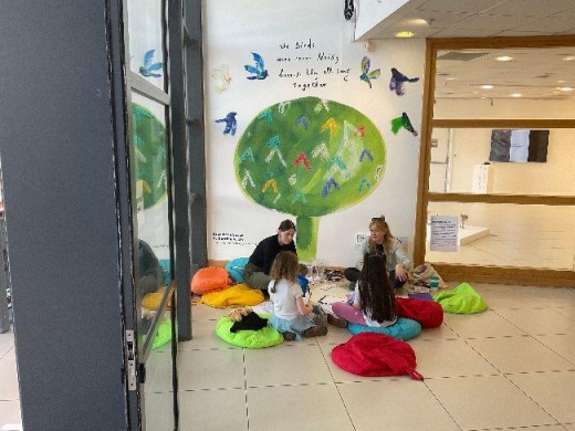 Philosophers Dr. Lucy Elvis and Dr Annie McKeown O’Donovan with children in Draíocht's Foyer